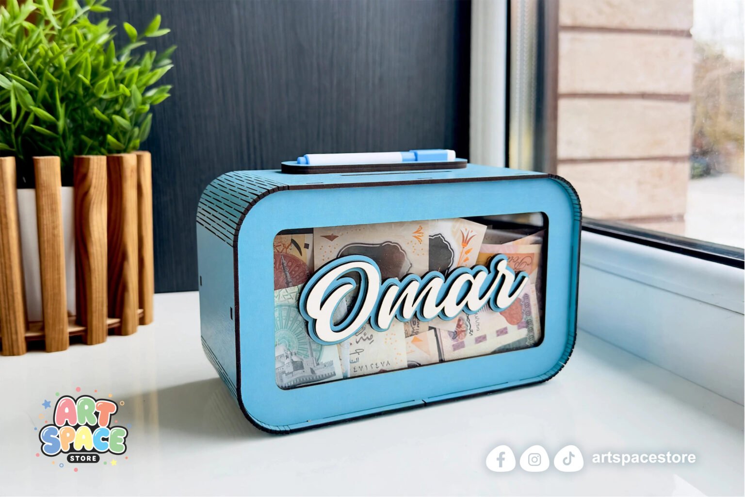 omar_money_box_windowsill_hi_res